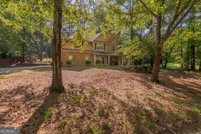 10230 Whitesville Road, House other with 5 bedrooms, 3 bathrooms and null parking in Fortson GA | Image 3