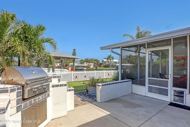 1061 Bali Rd, House other with 4 bedrooms, 2 bathrooms and null parking in Cocoa Beach FL | Image 48
