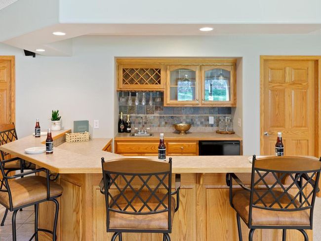 Tiled Backsplash and glass cabinets - 25259 Galaxy Ave Wyoming MN 55092 USA-060-026-061-MLS_Size.jpg | Image 36