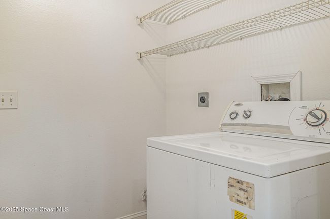 Unit #1232 laundry area with in-unit washer | Image 11