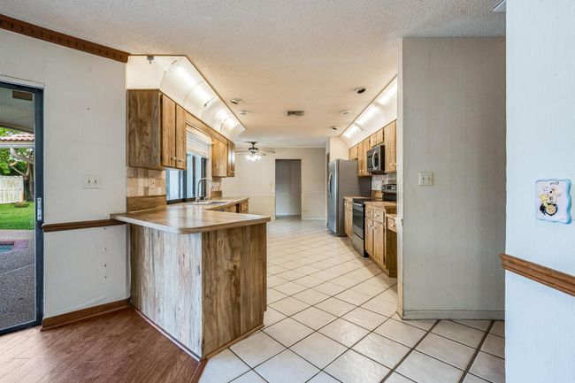 648 Nw 100 Th Ln, House other with 4 bedrooms, 2 bathrooms and null parking in CORAL SPRINGS FL | Image 11