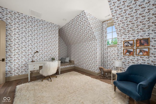 Fifth bedroom featuring sitting area | Image 62