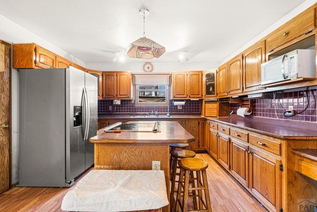 kitchen, cabinets galore, stainless steel applianc | Image 6