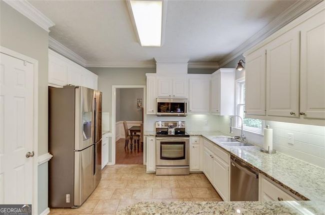 1180 Windridge Dr, House other with 4 bedrooms, 4 bathrooms and 2 parking in Loganville GA | Image 15