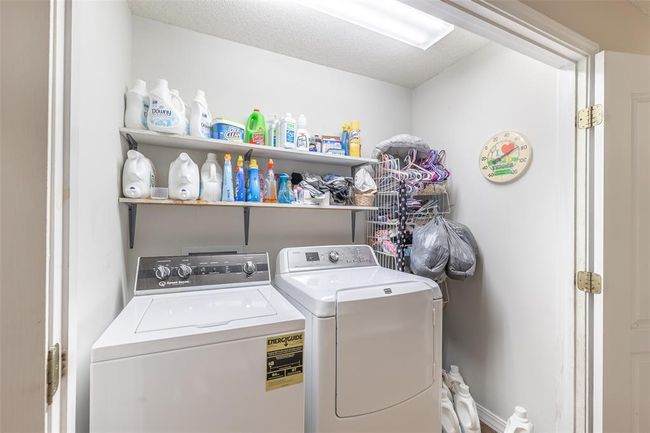Laundry area with washing machine and dryer | Image 27