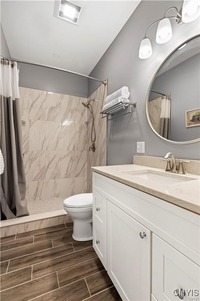 Main floor full bathroom | Image 15