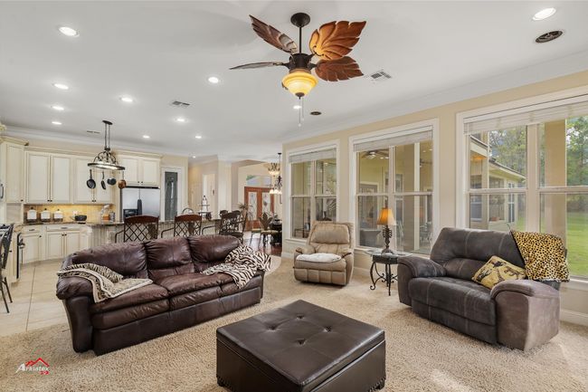View of family room and open floor plan kitchen. | Image 22