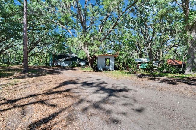 9724 Hermit Hollow Ln, House other with 4 bedrooms, 3 bathrooms and null parking in GIBSONTON FL | Image 73