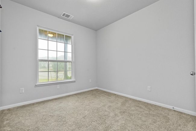 Secondary bedroom at the front of the house. | Image 25