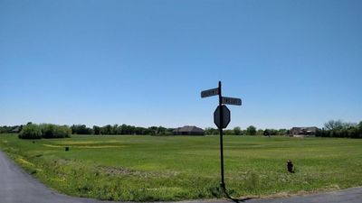 View of nearby features featuring a lawn | Image 1