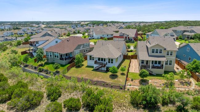 The yard backs to the community greenbelt providing for excellent privacy and serene views. | Image 33