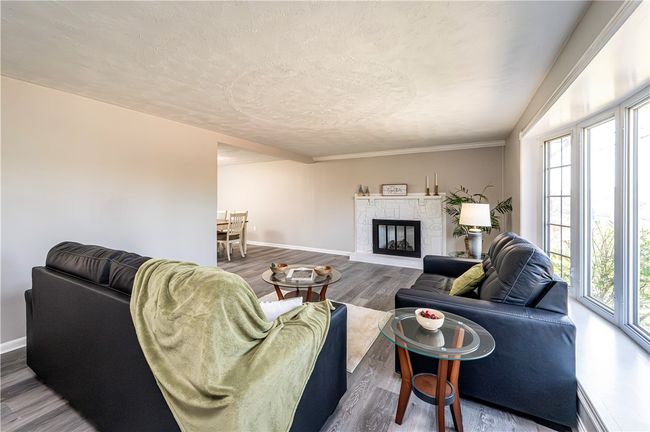As you enter the open and airy floor plan welcomes you! | Image 7