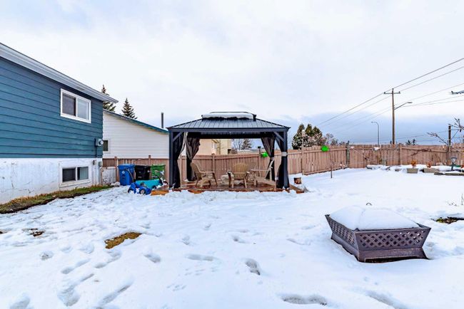 108 Whitaker Close Ne, Home with 5 bedrooms, 2 bathrooms and 2 parking in Calgary AB | Image 4