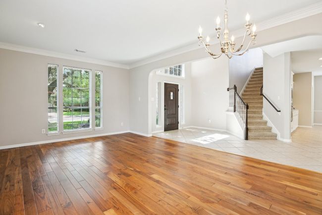 A welcoming foyer that sets the tone for warmth, elegance, and space. | Image 13