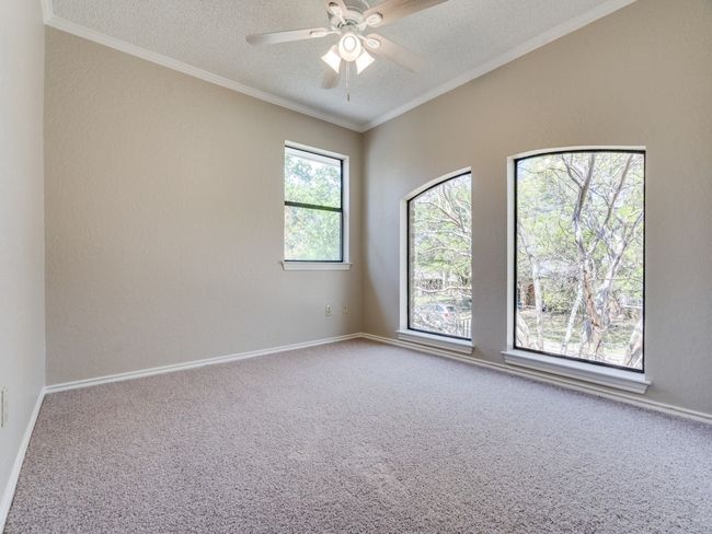 Bedroom 5 also has a closet and access down the hall to a full bath shared with bedroom 2. | Image 31