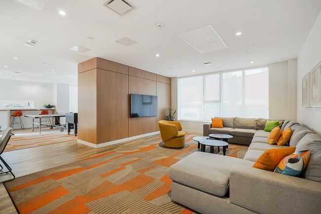 Living room featuring light wood finished floors, visible vents, and recessed lighting | Image 29