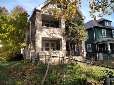 View of property featuring a balcony | Image 1