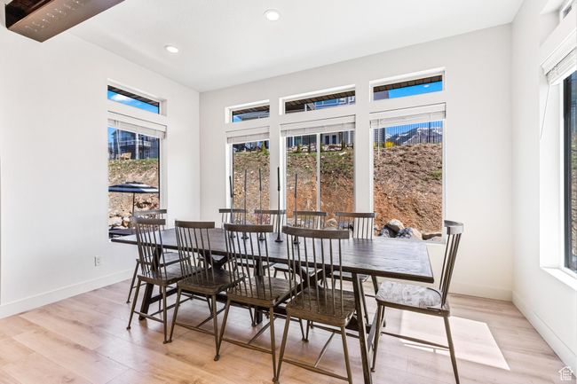 Dining area with recessed lighting, light wood-style flooring, and baseboards | Image 60