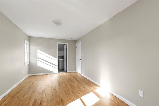 Unfurnished room with light wood-type flooring | Image 9