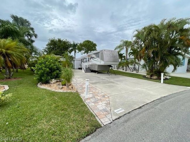 View of property exterior featuring a yard | Image 5