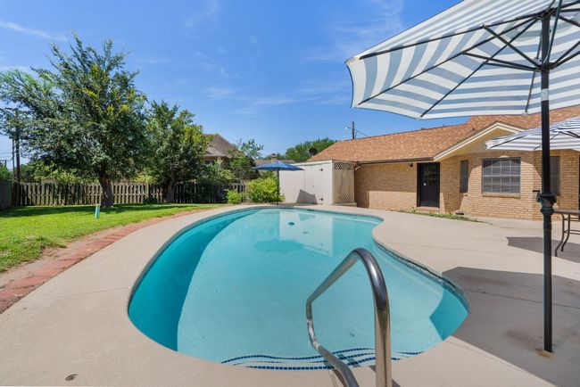 View of pool featuring a patio area | Image 28