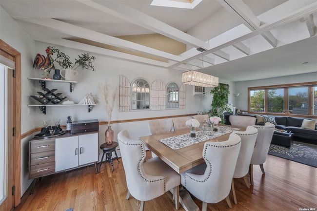 Showstopper Dining Rm w/Vaulted Ceiling, Designer Lighting & Exposed Beams! | Image 6