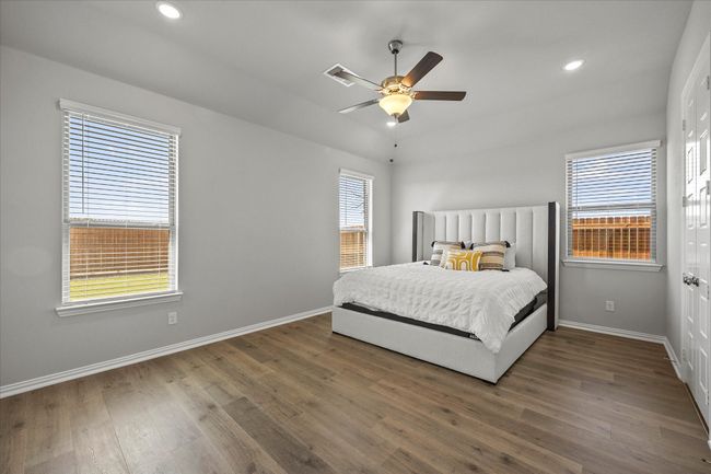 Primary Bedroom with ceiling fan | Image 12