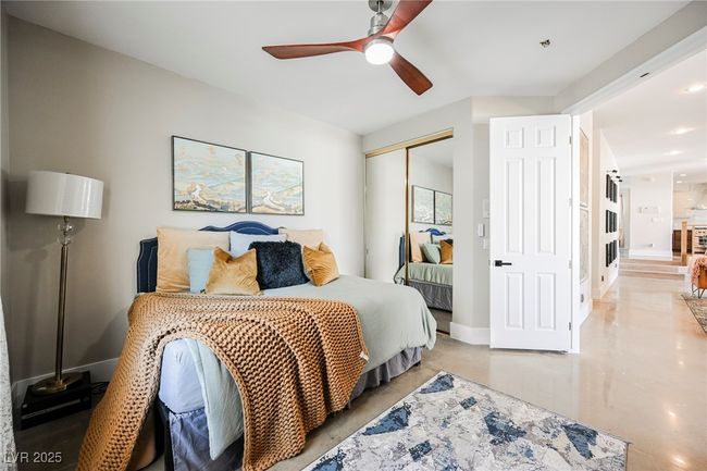 Downstairs Bedroom with baseboards, closet and a ceiling fan | Image 26
