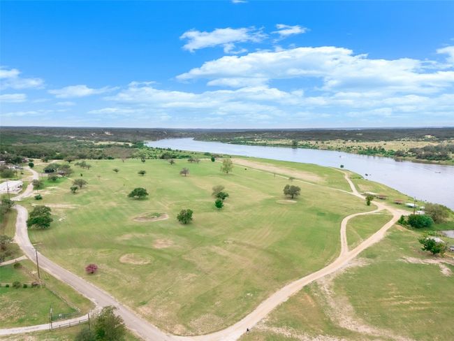 Drone / aerial view of community 9-hole golf course and Lake Travis | Image 22