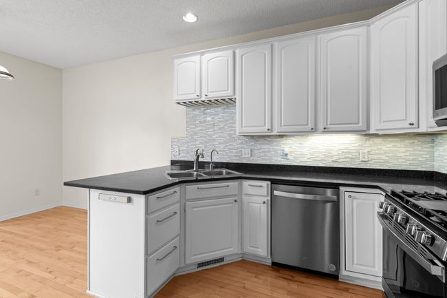 Add a couple stools and you have a breakfast bar. | Image 16