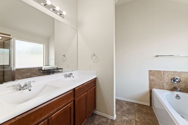 Full bath with double vanity and a bath | Image 24