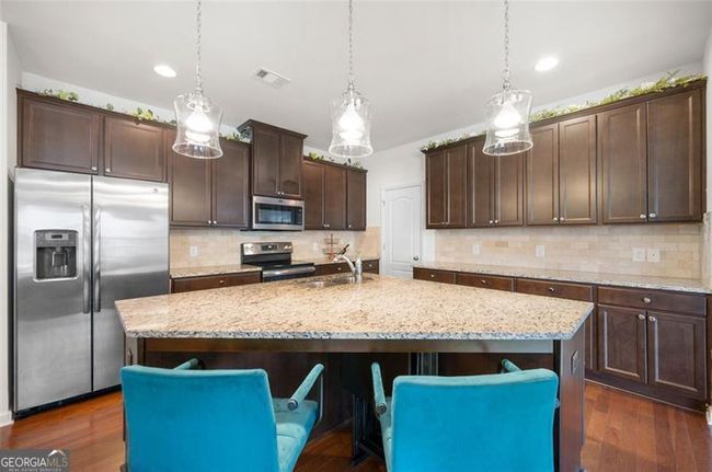 7788 Rutgers Cir, Townhouse with 3 bedrooms, 3 bathrooms and 2 parking in Fairburn GA | Image 12