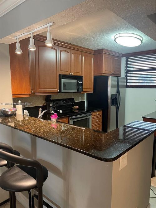 203-110 Lake Emerald Dr, OAKLAND PARK, FL, 33309-6207 | Card Image