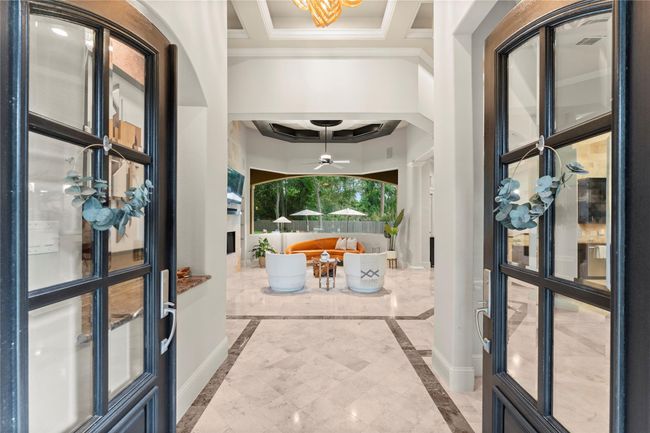From the moment you walk through the door, you’re welcomed by exquisite finishes and a thoughtfully designed open layout... | Image 12