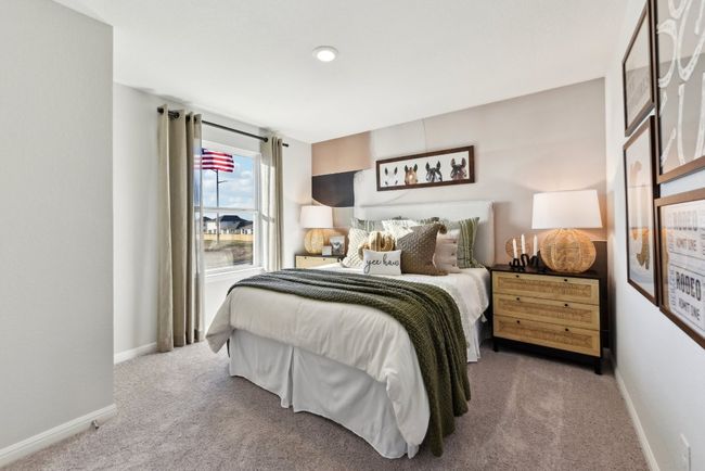 Bedroom featuring carpet floors and baseboards | Image 11