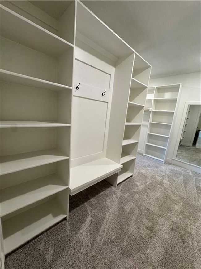 Mudroom with carpet | Image 43