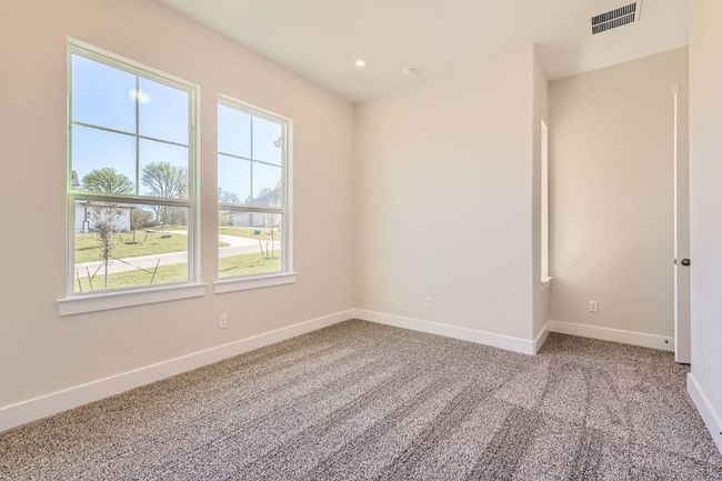 Carpeted spare room with baseboards, visible vents, and recessed lighting | Image 22