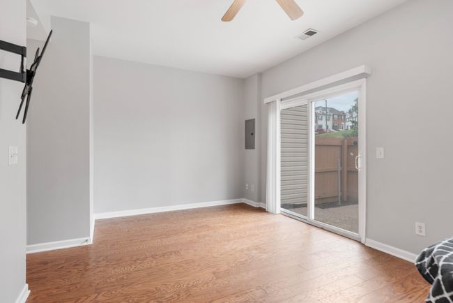 Cozy living room with direct access to the patio, perfect for relaxing or entertaining. | Image 9