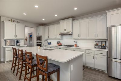 Kitchen with Spacious Quartz Island | Image 2