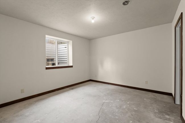 Bedroom in basement | Image 21