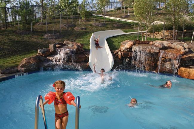 From swimming laps to sliding down our 140-foot water slide, soak up fun in the sun at our three pool complexes. | Image 35