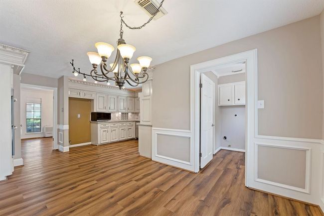 Breakfast room is off the kitchen. | Image 12