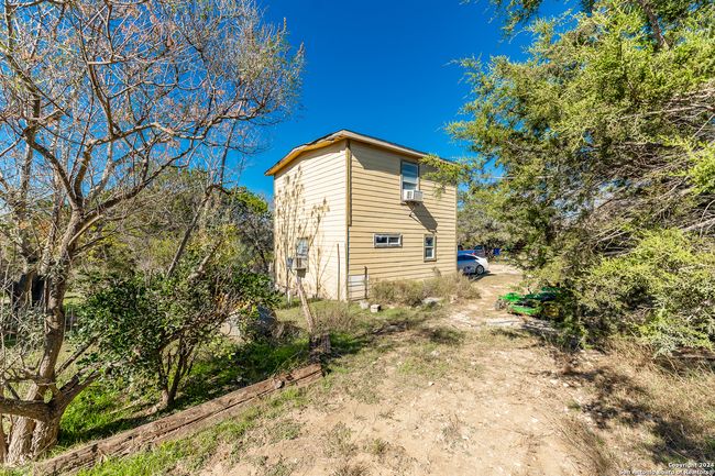 989 Oil Wl, Home with 3 bedrooms, 2 bathrooms and null parking in Pipe Creek TX | Image 24