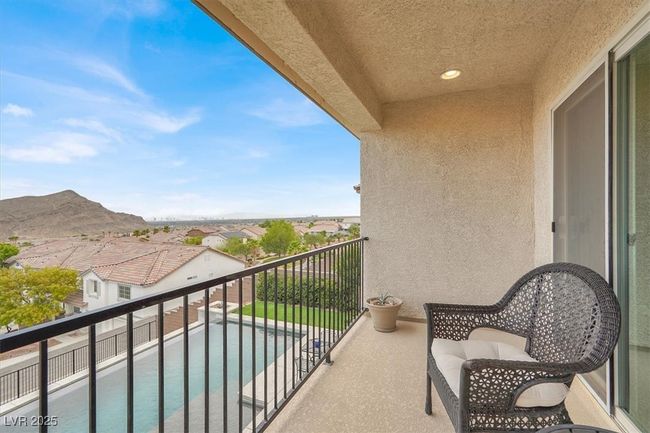 Balcony featuring view of pool | Image 37