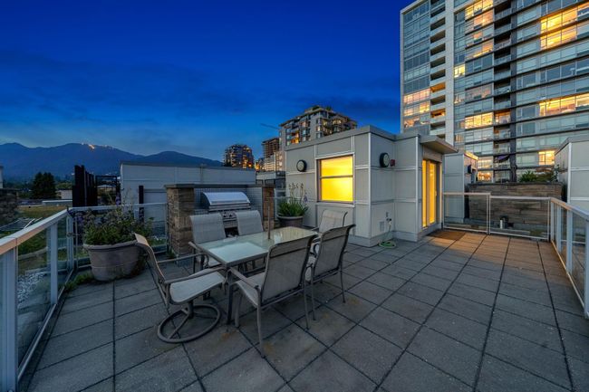 Patio / terrace with outdoor dining space, a mountain view, and grilling area | Image 28