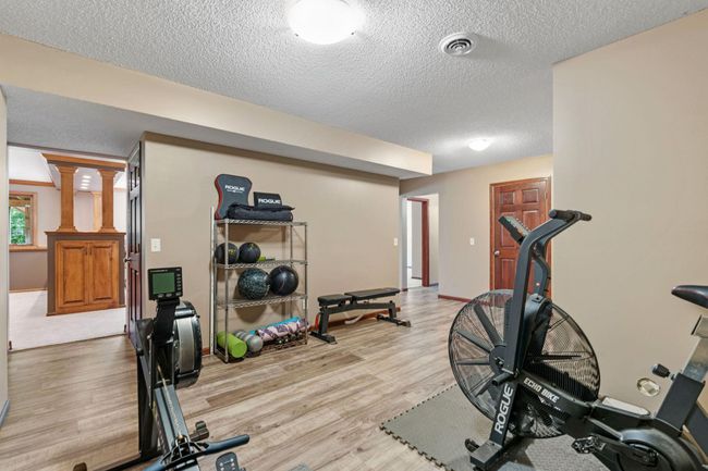 This space makes for a great workout spot or playroom. | Image 33