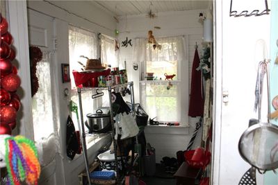 back enclosed porch. leads out to deck | Image 2