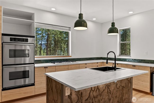 Double ovens and large surface area on center island. | Image 18