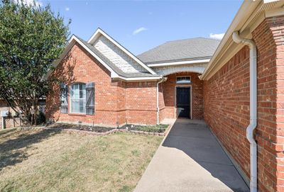 Property entrance featuring a lawn | Image 3