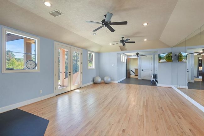 Leaving the main house, you enter the 27’x25’ fitness room | Image 35